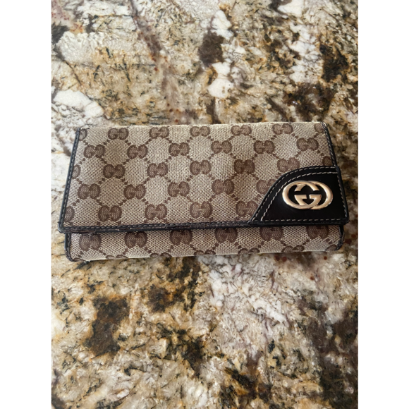 Gucci Handbags - authentic Gucci wallet
long with card holders & change holder